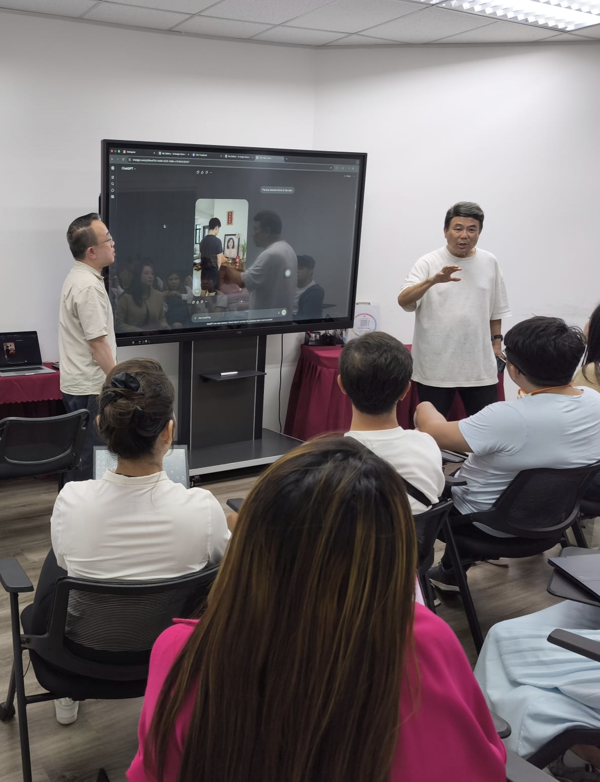 Lucas demonstrating AI-generated visuals on the academy's screen