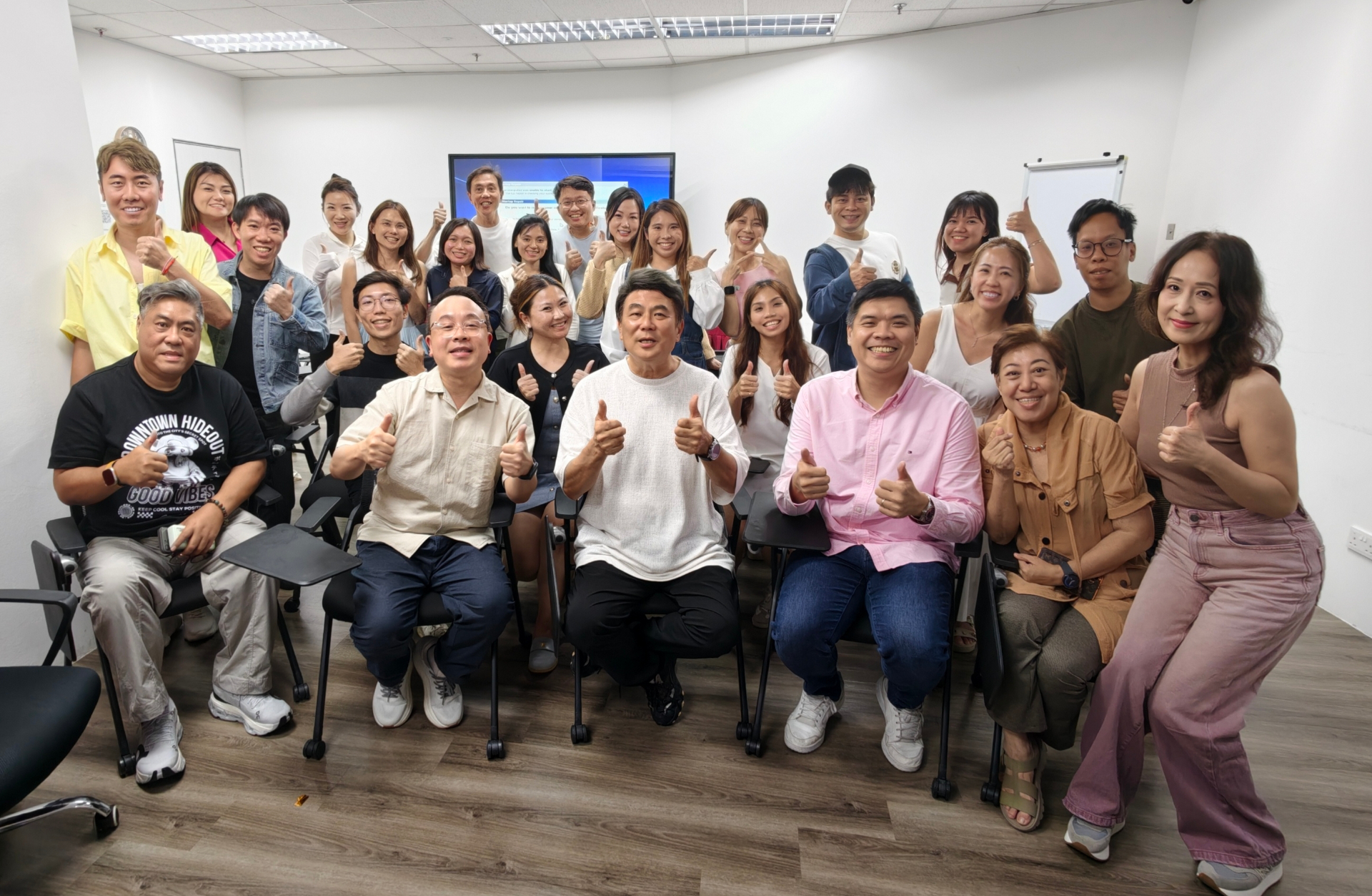 Group photo of Lucas with attendees at Jack Neo's director training academy